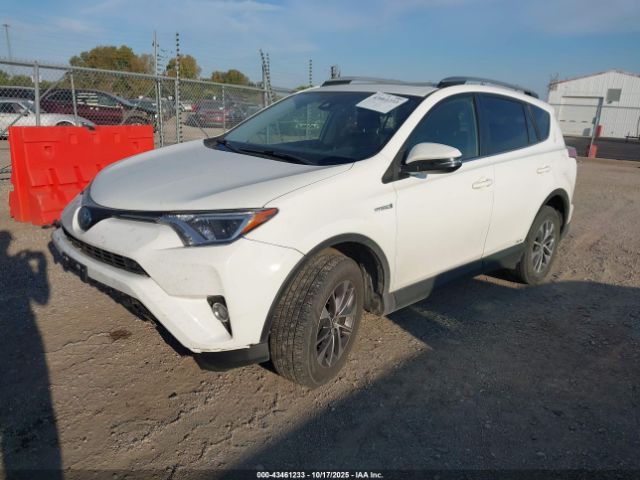 2018 TOYOTA RAV4 HYBRID JTMRJREV9JD185043 Photo 1