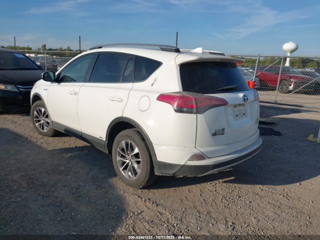 2018 TOYOTA RAV4 HYBRID JTMRJREV9JD185043 Photo 2