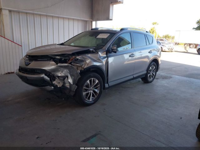 2018 TOYOTA RAV4 HYBRID JTMRJREVXJD172978 Photo 1