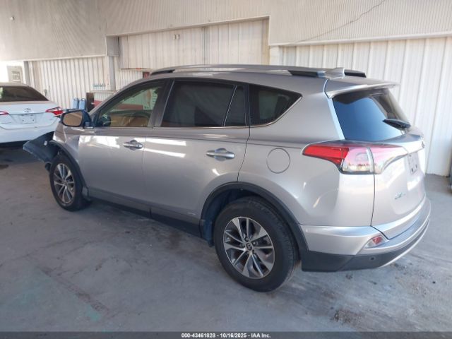 2018 TOYOTA RAV4 HYBRID JTMRJREVXJD172978 Photo 2