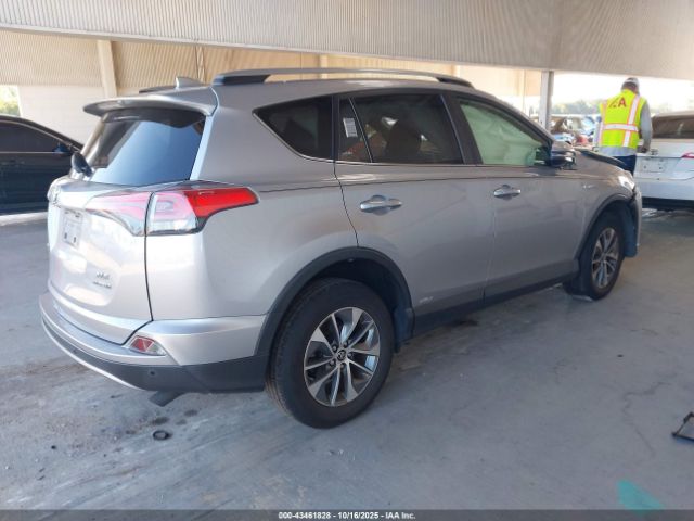 2018 TOYOTA RAV4 HYBRID JTMRJREVXJD172978 Photo 3
