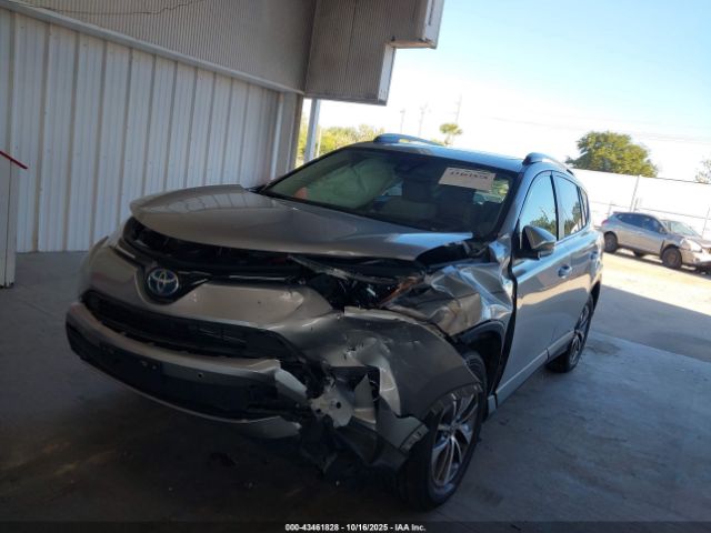 2018 TOYOTA RAV4 HYBRID JTMRJREVXJD172978 Photo 5