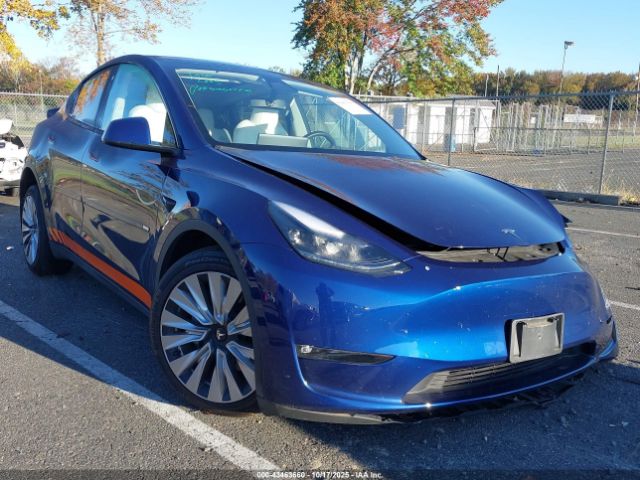 2023 TESLA MODEL Y 7SAYGDEE0PF701050 Photo 0