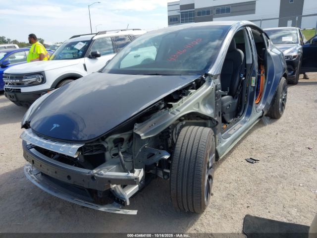 2024 TESLA MODEL Y 7SAYGDEF8RA291235 Photo 1
