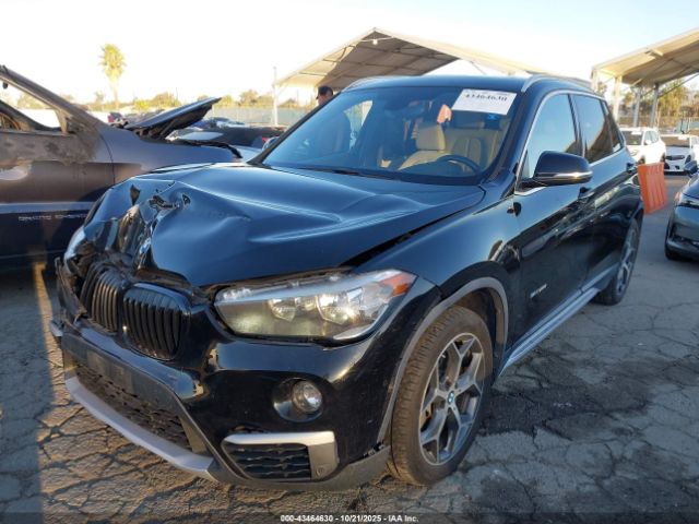 2018 BMW X1 WBXHU7C32J5H42562 Photo 1