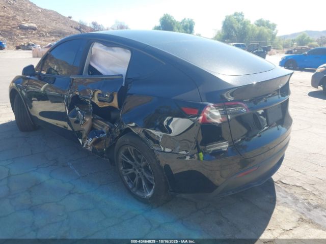 2025 TESLA MODEL Y 7SAYGDED5SF248415 Photo 2