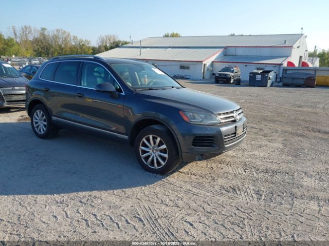 2011 VOLKSWAGEN TOUAREG WVGFF9BP5BD000932