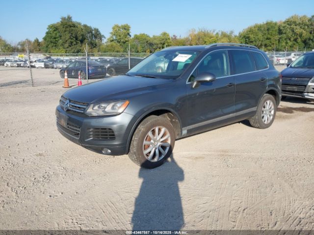 2011 VOLKSWAGEN TOUAREG WVGFF9BP5BD000932 Photo 1
