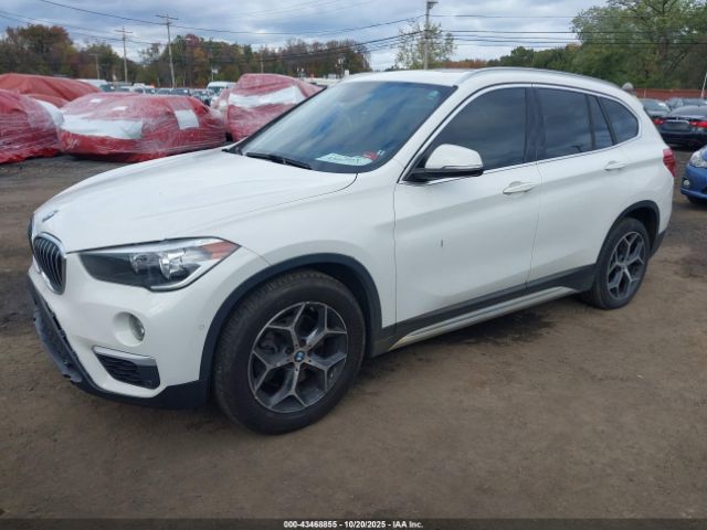 2018 BMW X1 WBXHT3C34J5L34864 Photo 1