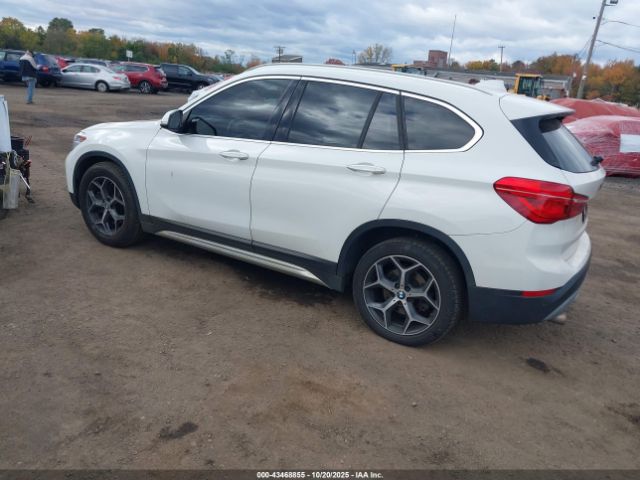 2018 BMW X1 WBXHT3C34J5L34864 Photo 2