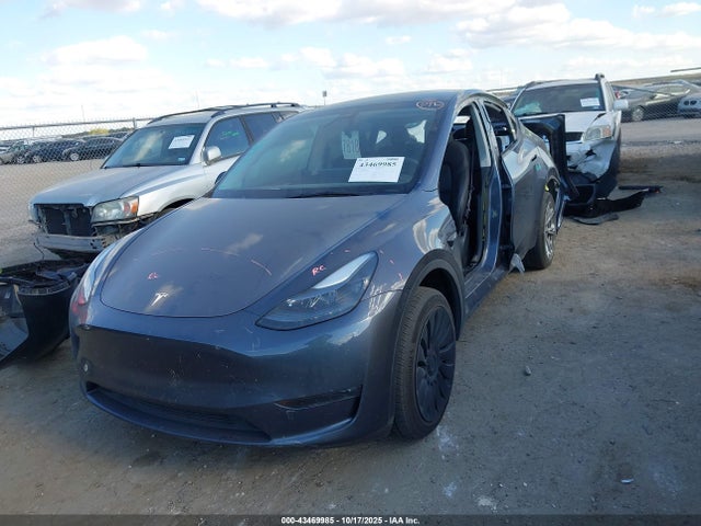 2023 TESLA MODEL Y 7SAYGDED2PF960954 Photo 1