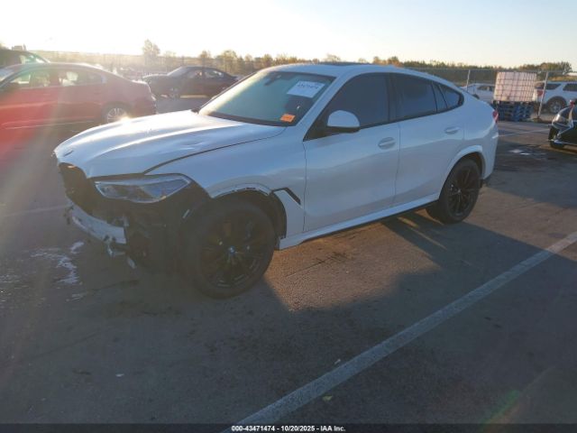 2021 BMW X6 5UXCY6C09M9H71208 Photo 1