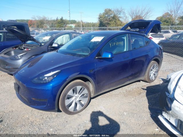 2024 TESLA MODEL Y 7SAYGDED6RF038089 Photo 1