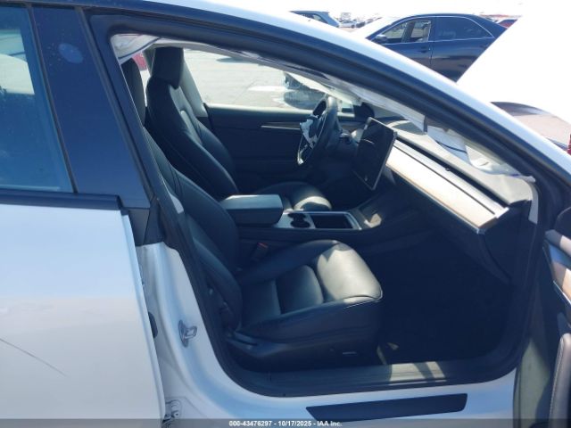 2023 TESLA MODEL 3 5YJ3E1EA1PF606036 Photo 4