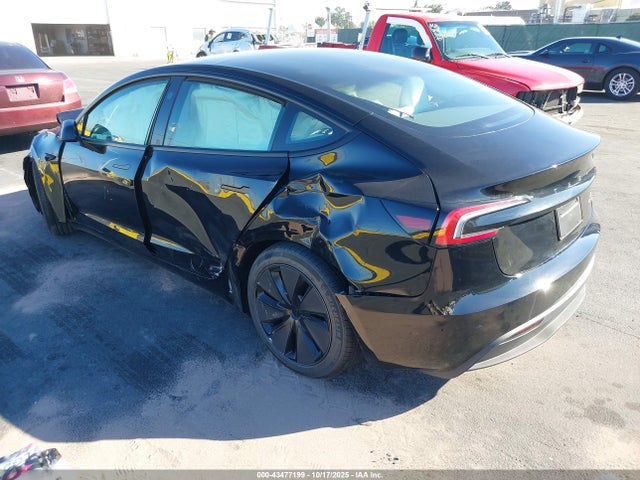 2025 TESLA MODEL 3 5YJ3E1EBXSF048995 Photo 2