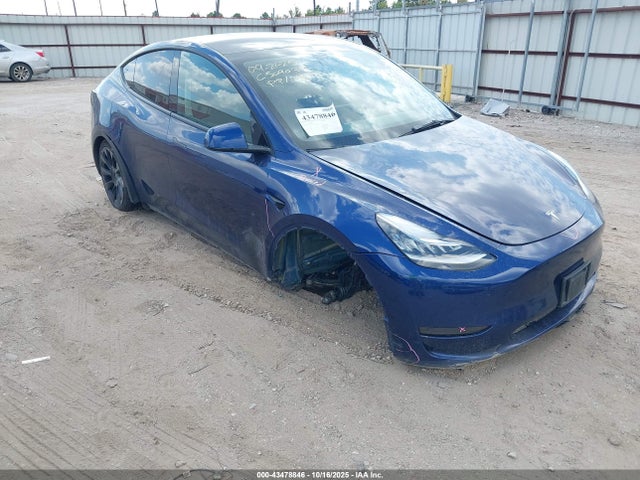 2023 TESLA MODEL Y 7SAYGDEE1PA051528 Photo 0