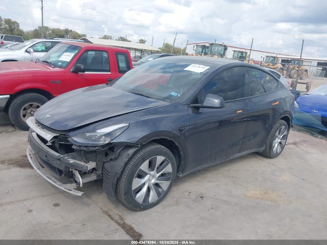 2024 TESLA MODEL Y 7SAYGDEE5RA227483 Photo 1