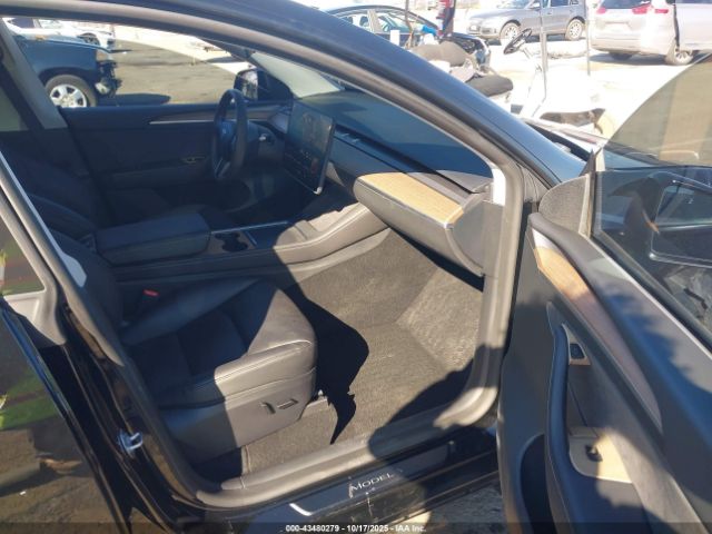 2023 TESLA MODEL Y 7SAYGDEF7PF908219 Photo 4