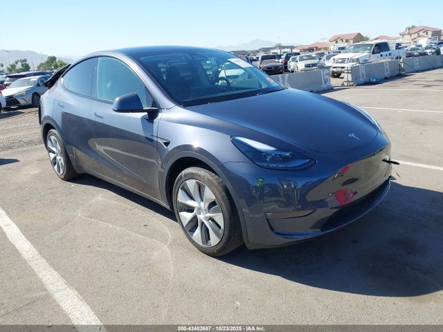 2023 TESLA MODEL Y 7SAYGDED5PF961452 Photo 0