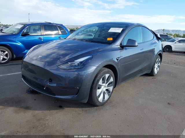 2023 TESLA MODEL Y 7SAYGDED5PF961452 Photo 1
