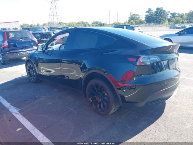2025 TESLA MODEL Y 7SAYGDEE3SA361091 Photo 2