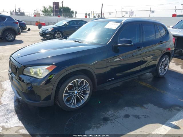 2013 BMW X1 WBAVM5C52DVV89251 Photo 1