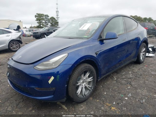 2024 TESLA MODEL Y 7SAYGDEE1RA269634 Photo 1