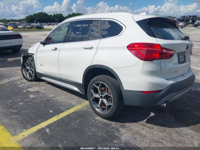 2018 BMW X1 WBXHT3C3XJ5K21131 Photo 2
