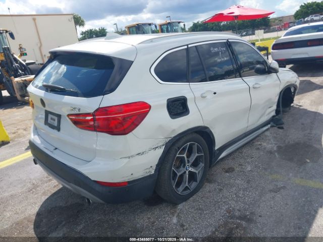 2018 BMW X1 WBXHT3C3XJ5K21131 Photo 3