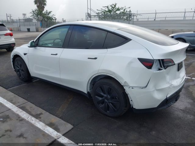 2024 TESLA MODEL Y 7SAYGAEE4RF206674 Photo 2