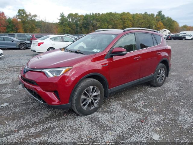 2018 TOYOTA RAV4 HYBRID JTMRJREV7JD240945 Photo 1