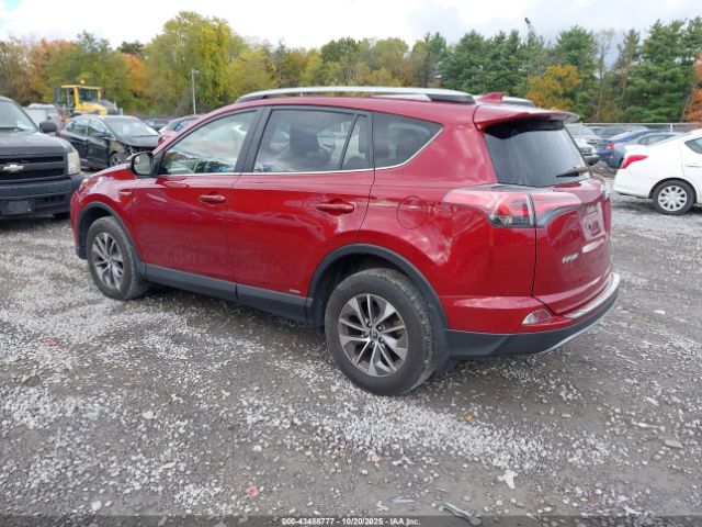 2018 TOYOTA RAV4 HYBRID JTMRJREV7JD240945 Photo 2