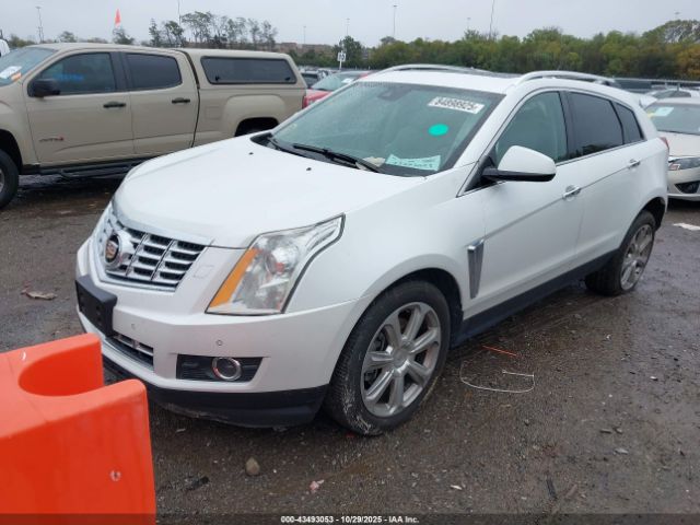 2014 CADILLAC SRX 3GYFNDE32ES677700 Photo 1