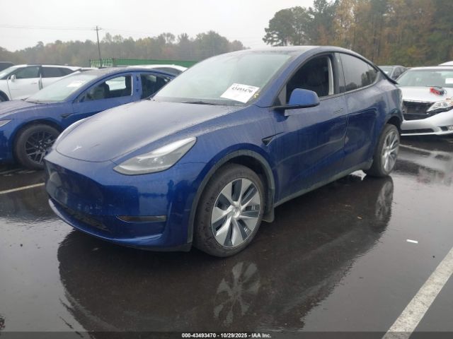 2023 TESLA MODEL Y 7SAYGDEE7PF664045 Photo 1