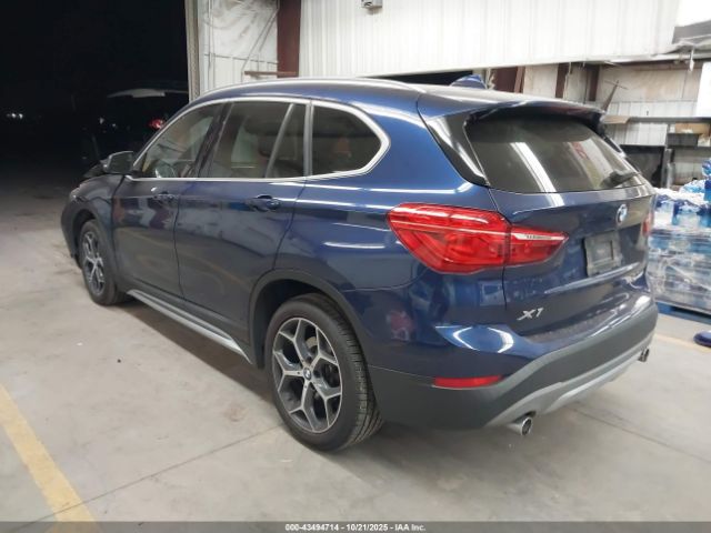 2018 BMW X1 WBXHU7C39J5L09401 Photo 2