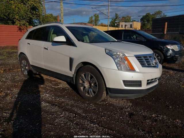 2015 CADILLAC SRX 3GYFNEE36FS595878 Photo 0