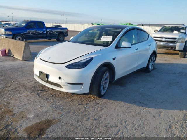 2024 TESLA MODEL Y 7SAYGDEE9RA289890 Photo 1