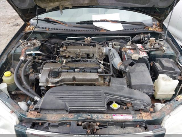 1999 MAZDA PROTEGE JM1BJ2222X0152081 Photo 9