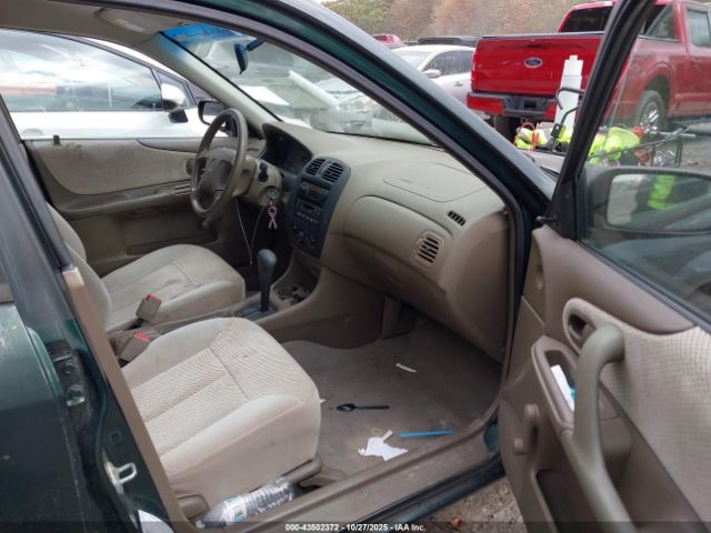 1999 MAZDA PROTEGE JM1BJ2222X0152081 Photo 4