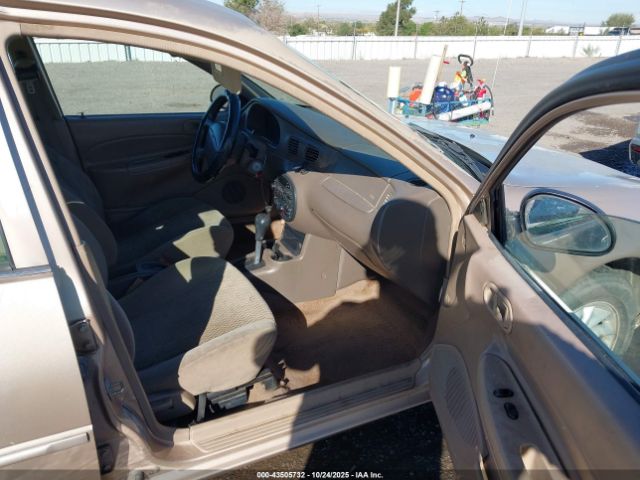 2000 FORD ESCORT 3FAFP13P9YR208934 Photo 4