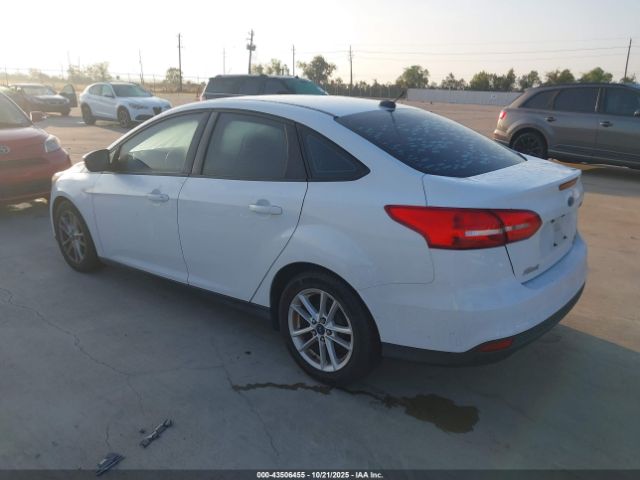 2015 FORD FOCUS 1FADP3F24FL381873 Photo 2