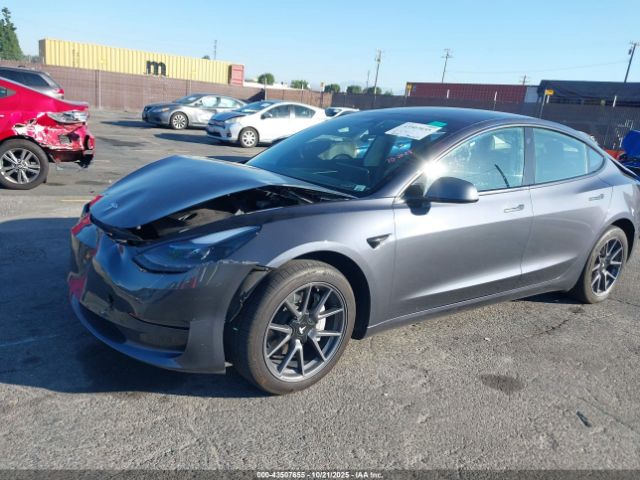2023 TESLA MODEL 3 5YJ3E1EB2PF693549 Photo 1