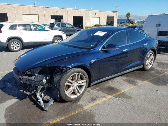 2015 TESLA MODEL S 5YJSA1H1XFFP72590 Photo 1