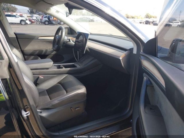 2023 TESLA MODEL Y 7SAYGDEE9PA110583 Photo 4