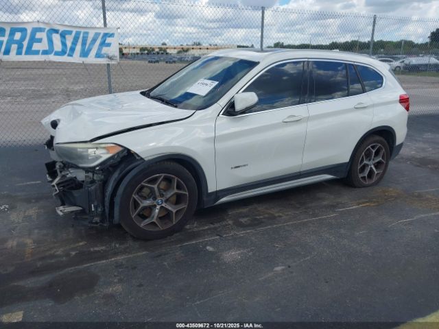2017 BMW X1 WBXHU7C35H5H33042 Photo 1