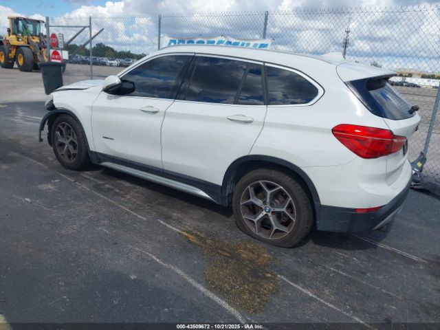 2017 BMW X1 WBXHU7C35H5H33042 Photo 2