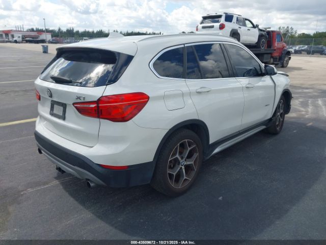 2017 BMW X1 WBXHU7C35H5H33042 Photo 3