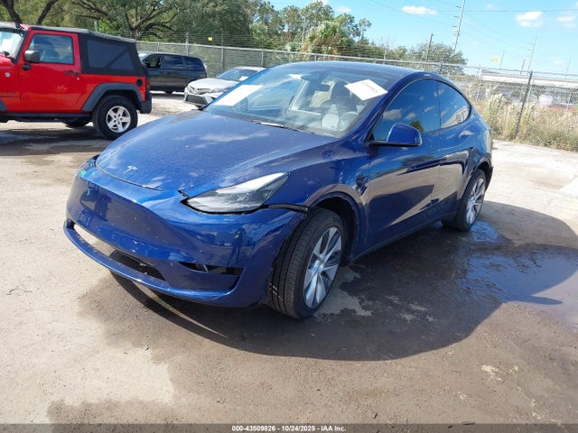 2024 TESLA MODEL Y 7SAYGDEE7RA265684 Photo 1