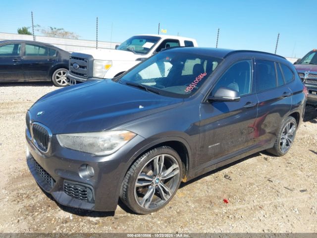 2018 BMW X1 WBXHU7C33J5H38892 Photo 1