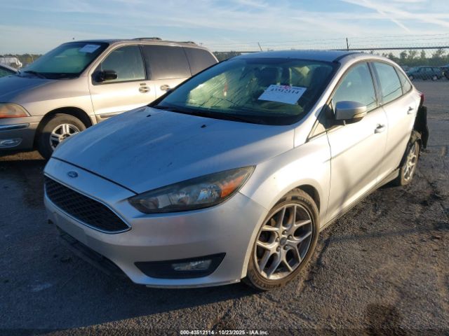 2015 FORD FOCUS 1FADP3F26FL323814 Photo 1